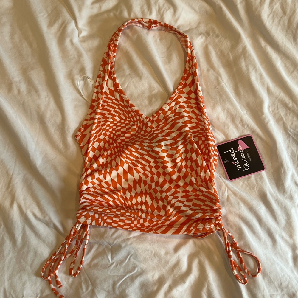 Orange and white checkered halter top (s)
